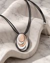 Layered Oval Ring Pendant Necklace with Black Multi-Strand Cord