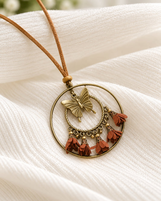 Bronze Butterfly Double Hoop Necklace with Rust Fabric Flower Tassels