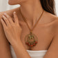Bronze Butterfly Double Hoop Necklace with Rust Fabric Flower Tassels