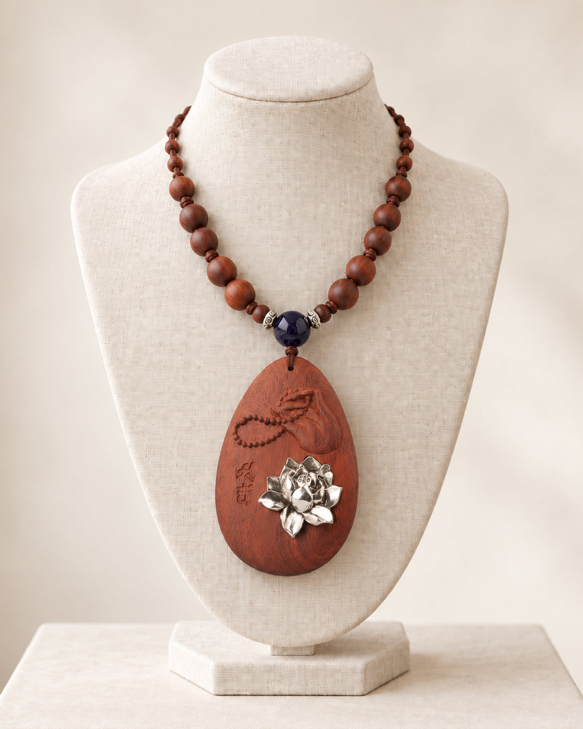 Silver Lotus Bloom Oval Rosewood Pendant Necklace with Carved Leaf Detail *