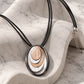 Layered Oval Ring Pendant Necklace with Black Multi-Strand Cord