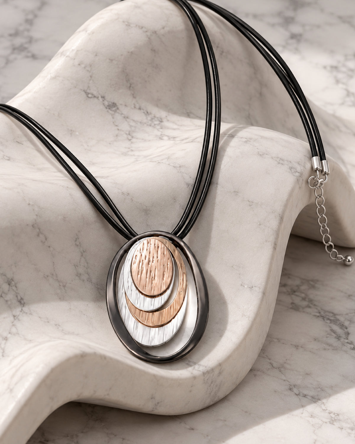 Layered Oval Ring Pendant Necklace with Black Multi-Strand Cord