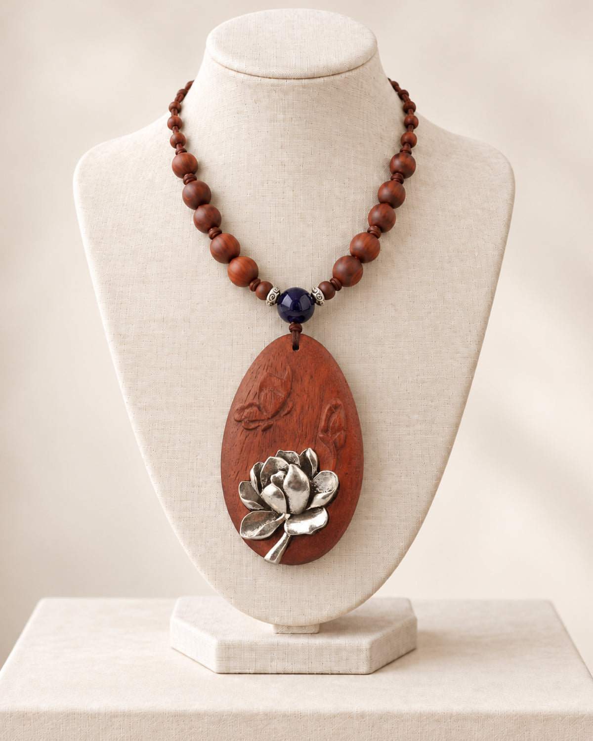 Silver Lotus Bloom Oval Rosewood Pendant Necklace with Carved Leaf Detail