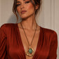 Organic Wire Circle Pendant Necklace with Green Stone on Tan Cord