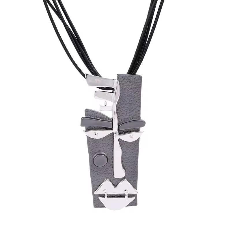 Abstract Geometric Face Pendant Necklace with Multi-Strand Cord