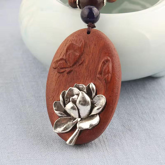 Silver Lotus Bloom Oval Rosewood Pendant Necklace with Carved Leaf Detail