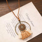 Antique Bronze Hoop Rhinestone Medallion Necklace with Cream & Tan Tassels